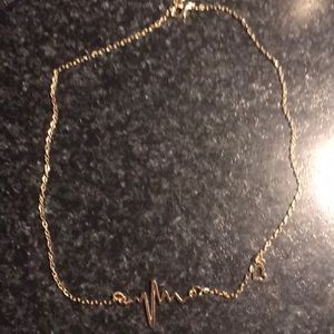 Very cute gold costume jewelry heart necklace